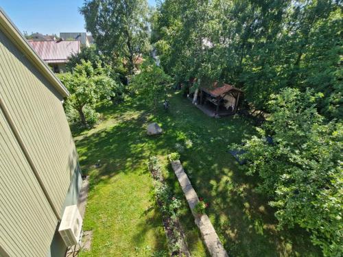 an overhead view of a yard with trees and a house at Piibelehe Guest Accommodation in Kuressaare