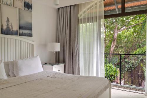 Katil atau katil-katil dalam bilik di D'Retreat 1BHK Apartment by tisyastays