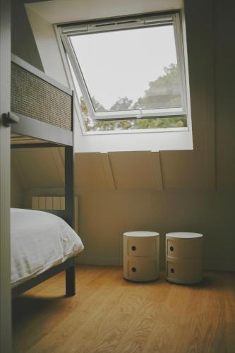Katil atau katil-katil dalam bilik di Maisons Bodenn - Lesconil