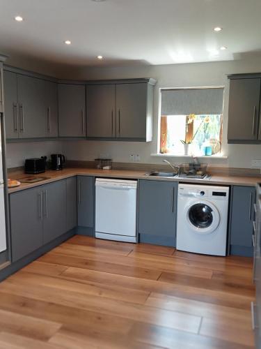Una cocina o zona de cocina en This is it - Along the Coast