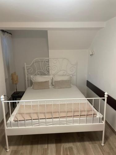 Ένα ή περισσότερα κρεβάτια σε δωμάτιο στο Apartments Isabel Krk