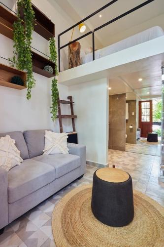 Coin salon dans l'établissement AmazINN Places Boutique Casa Arias