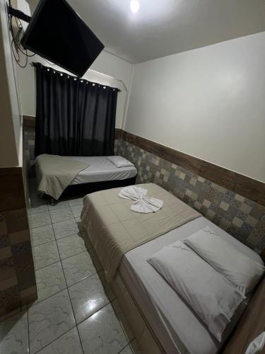 Katil atau katil-katil dalam bilik di Hotel Meyer