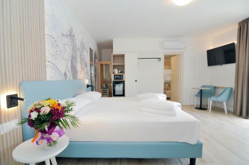 Postel nebo postele na pokoji v ubytování Marina Palace Hotel 4 stelle S