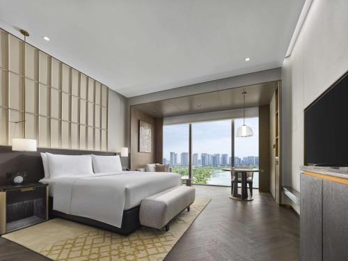 Cama o camas de una habitación en Hilton Changshu