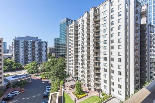 an aerial view of buildings in a city at Stylish 2BR Haven - Minutes from DC & Airport in Arlington