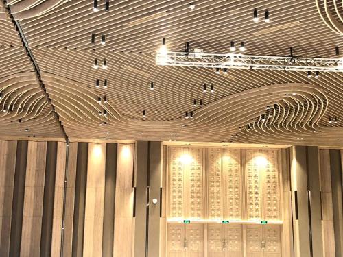 a ceiling in a building with lights on it at The KH Cam Ranh Nha Trang Beachside in Thôn Hòa Ða