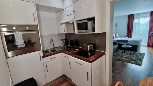 Cucina o angolo cottura di Camden Prime ApartHotel