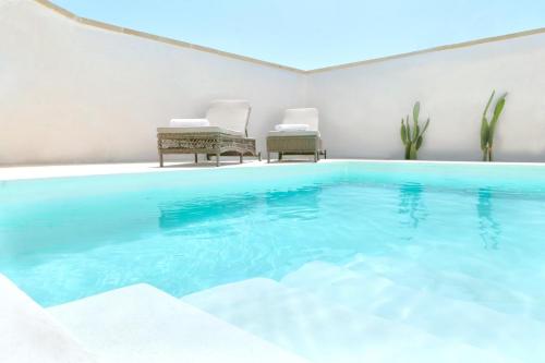 Πισίνα στο ή κοντά στο Terrarossa Salento Luxury Home