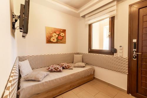 Χώρος καθιστικού στο Dafni's Beachfront Luxury Studios