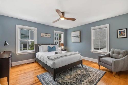 a bedroom with a bed and a ceiling fan at Historic & Modern Capitol Hill 2-BR Row Home in Washington, D.C.