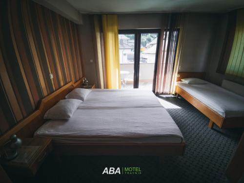 Postel nebo postele na pokoji v ubytování Garni Motel Aba