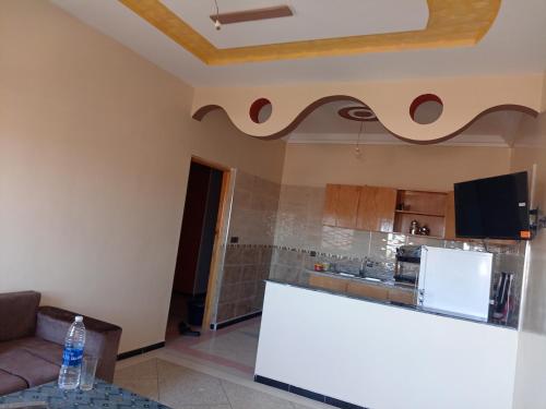 Kuchyň nebo kuchyňský kout v ubytování Residence El Oukhowa