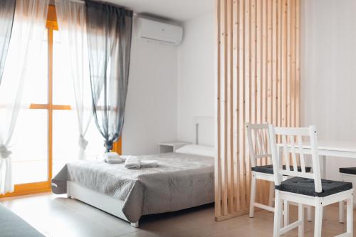 Ένα ή περισσότερα κρεβάτια σε δωμάτιο στο Apartamentos Wayteko Calpe