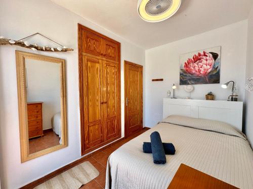 Ένα ή περισσότερα κρεβάτια σε δωμάτιο στο Casa Playa Abades