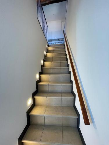 a staircase in a house with lights on it at Sea view Camogli Portofino in Camogli