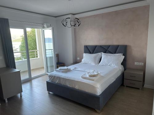 Postel nebo postele na pokoji v ubytování Hotel DEMOLI
