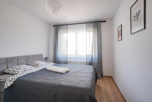 Postel nebo postele na pokoji v ubytování Apartman Sanda