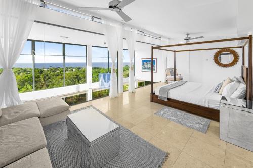 Llit o llits en una habitació de Ignorant Bliss Barbados