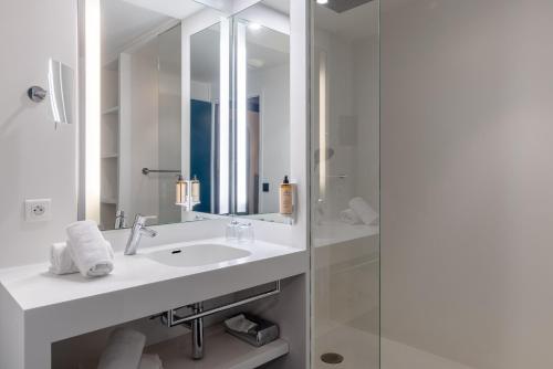 Salle de bains dans l'établissement Mercure Annecy Centre