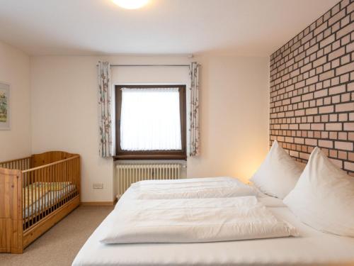 Ένα ή περισσότερα κρεβάτια σε δωμάτιο στο Apartment Eifelnatur - Haus 1-1 by Interhome