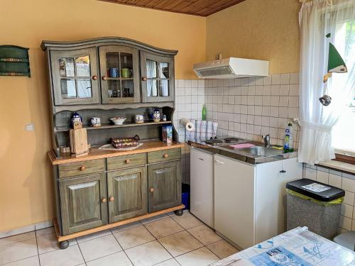 Kuchyň nebo kuchyňský kout v ubytování Holiday Home Ferienhaus Pier 15 A by Interhome