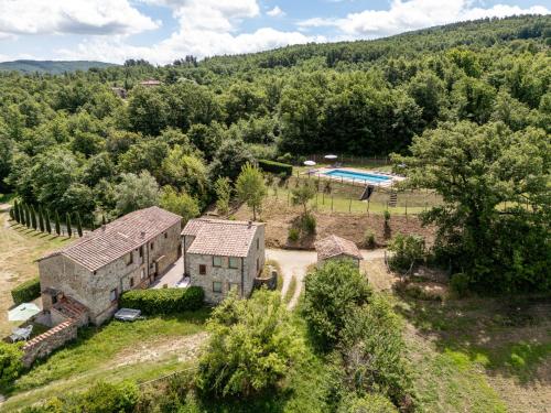 an aerial view of a house with a swimming pool at Apartment Arco by Interhome in Travale