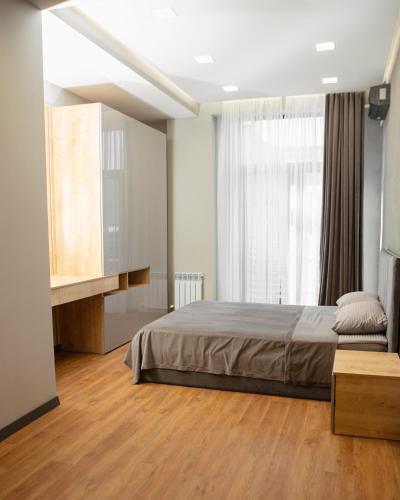Llit o llits en una habitació de Villa 83