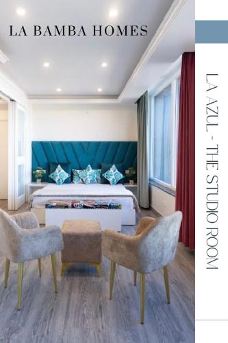 Ένα ή περισσότερα κρεβάτια σε δωμάτιο στο La Bamba Homes