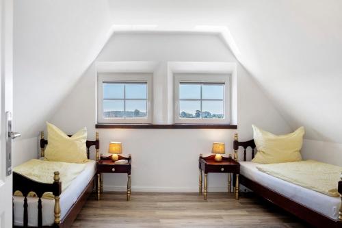 Postel nebo postele na pokoji v ubytování Ferienwohnung Ostwind