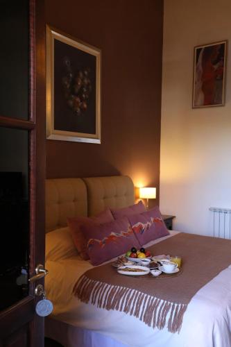 Postel nebo postele na pokoji v ubytování Lamadrid Guest House