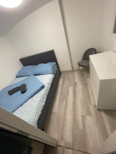 Posteľ alebo postele v izbe v ubytovaní Türkiz Apartman Siófok