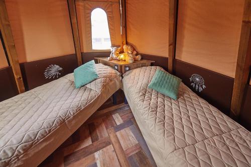 Postel nebo postele na pokoji v ubytování Lodge Tipi, L'Indienne