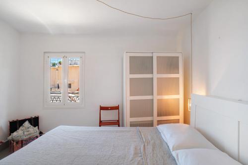 Ένα ή περισσότερα κρεβάτια σε δωμάτιο στο Seaview Flat Old Town Sanremo