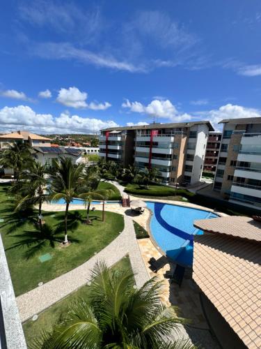 Πισίνα στο ή κοντά στο Cobertura exclusiva duplex com vista incrível da praia de Porto das Dunas