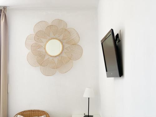 TV a/nebo společenská místnost v ubytování Habitación céntrica con Aire Acondicionado Baño privado Nevera