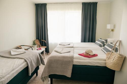 Cama o camas de una habitación en Hälleviks Havsbad