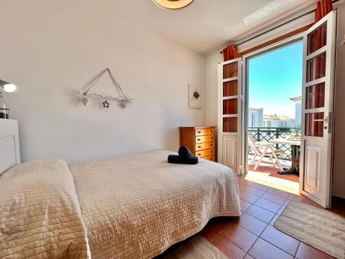 Ένα ή περισσότερα κρεβάτια σε δωμάτιο στο Casa Playa Abades