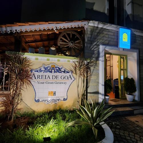 a sign for aarma de colaarmaarmaarmaarmaarmaarmaarma company at Ronnie's Studio Apartment in Arpora
