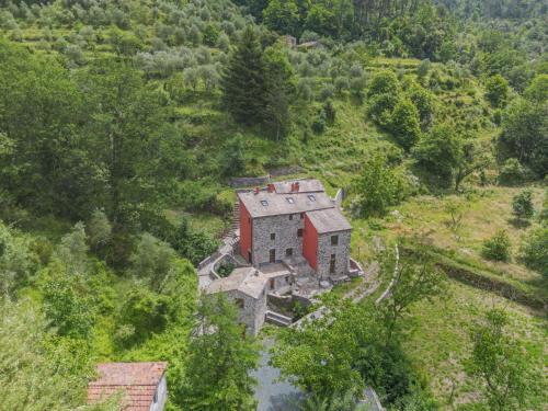 an aerial view of an old house on a hill at Apartment Vermentino by Interhome in Castiglione Chiavarese