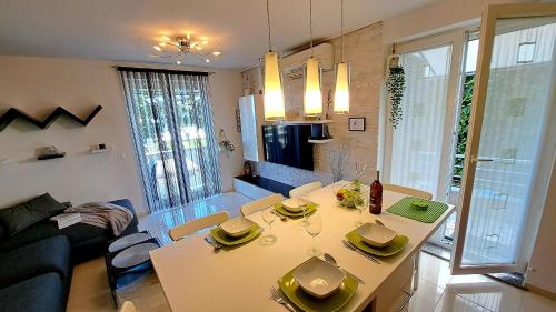 TV a/nebo společenská místnost v ubytování Apartman Seaside