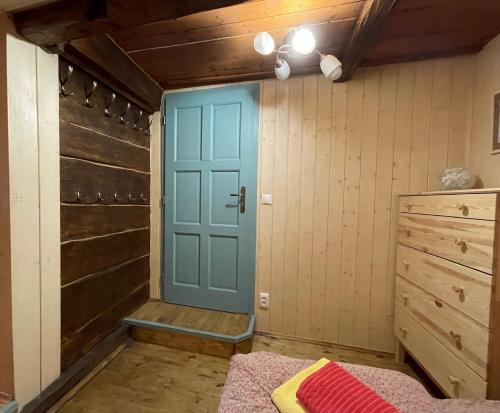 Una cama o camas en una habitación de Chata Violka Kvilda