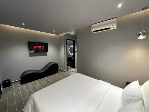 Postel nebo postele na pokoji v ubytování Midas Hotel 2