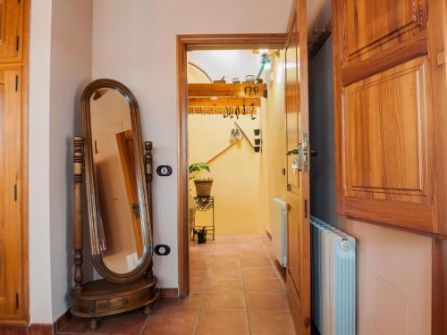 a bathroom with a mirror and a hallway at Holiday Home Rosa by Interhome in Cabanes