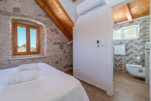 Vannituba majutusasutuses Stone house Grgo