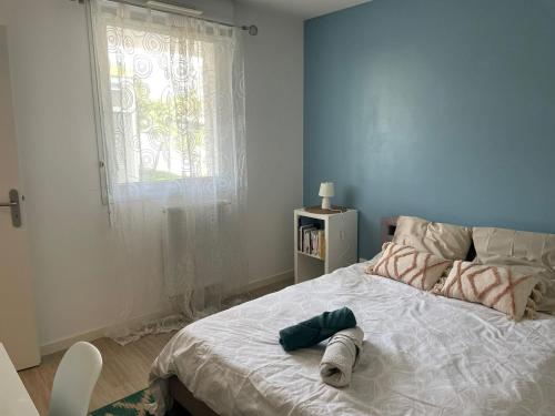 Ένα ή περισσότερα κρεβάτια σε δωμάτιο στο Chambre chez l'habitant, Rive droite Bordeaux Floirac