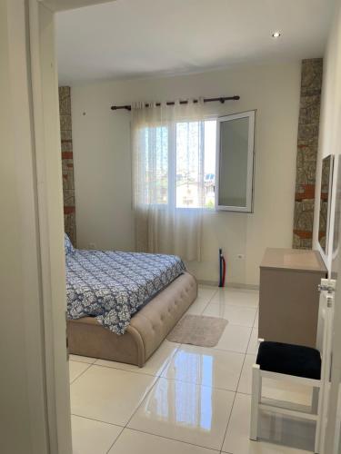 Postel nebo postele na pokoji v ubytování Franco Apartments