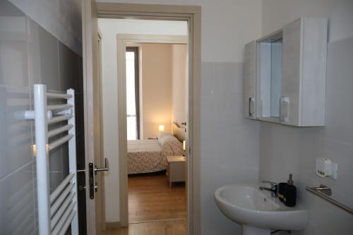 Postel nebo postele na pokoji v ubytování A due passi dal centro, Valentino's Apartment