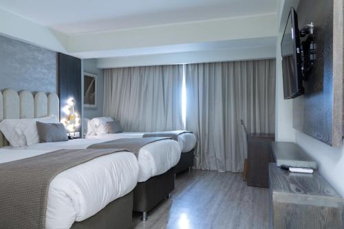 Postel nebo postele na pokoji v ubytování Hotel HW High Wellness