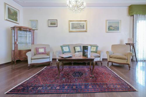 Zona de estar de QUEEN HOME Isabel